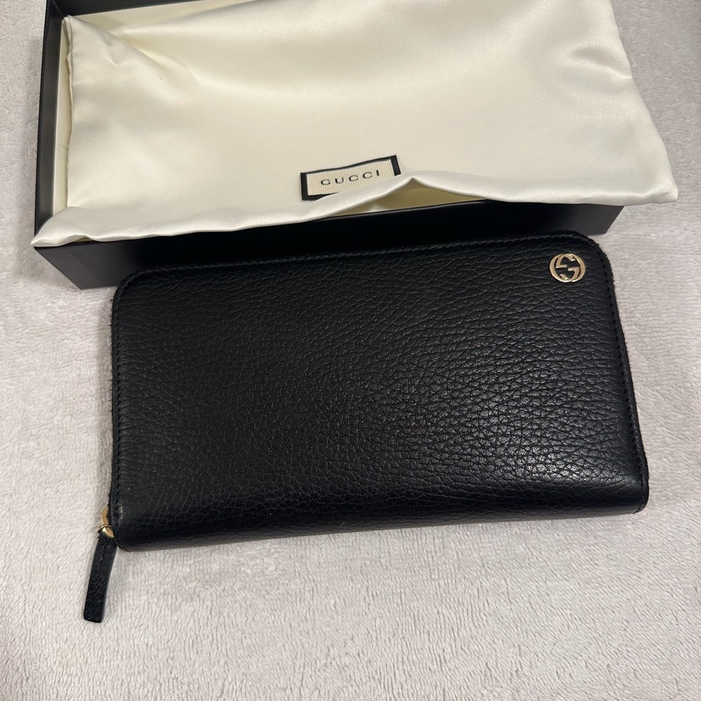 Gucci zippy wallet with signature GG on front - Picture 6 of 7